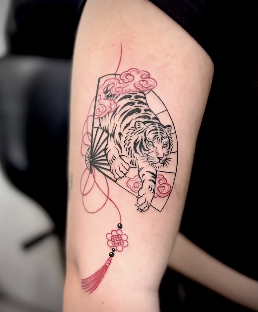 Fineline tattoo with colour, done by Anna